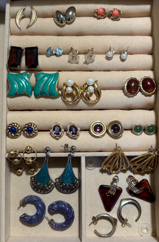 Twenty pairs of Avon earrings