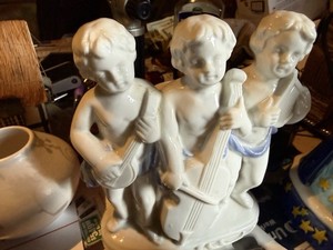 vintage porcelain bisque cherub figurines,  cherubs playing musical instruments