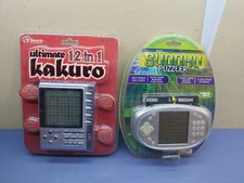 Ultimate 12 in 1 Kakuro & Sudoku Puzzler Electronic Handheld Game Factory Sealed