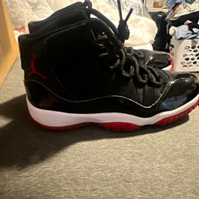 Jordan Air Jordan 11 Retro Bred Men  s High Top Basketball Sneaker Black Red