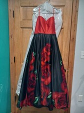 prom dress size 11 red and black with red flowers. Corset top no straps