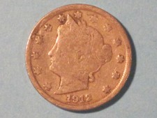 1912 Liberty Head Nickel 'Libert ' visible.  Nice enough for an album.