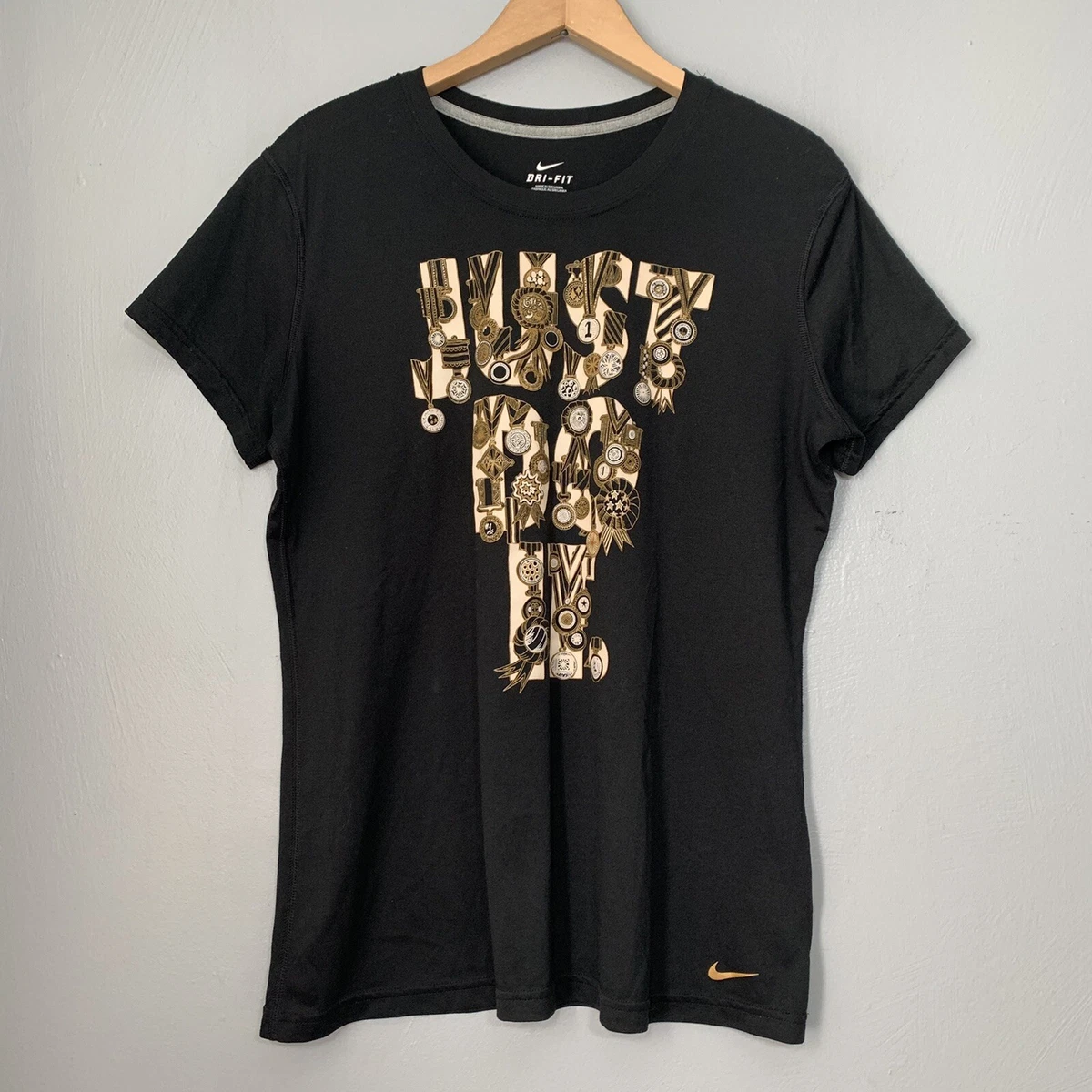 black and gold womens nike shirt
