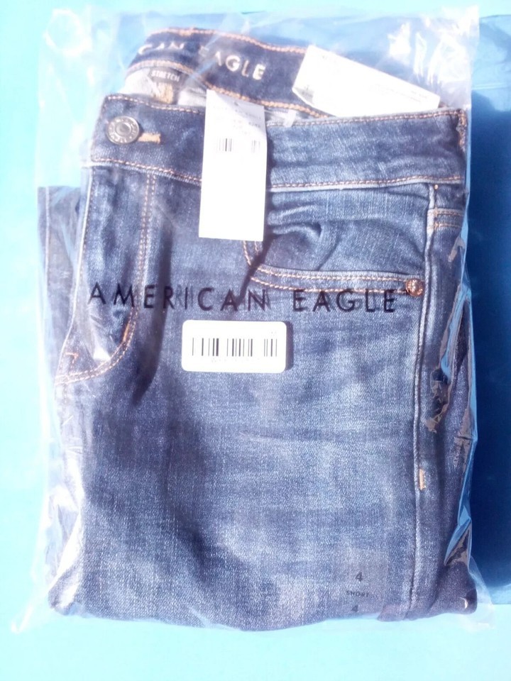 RARE AMERICAN EAGLE LOW RISE FLARE CAMPUS BRIGHTS STRETCH JEANS W 27 SIZE4 SHORT