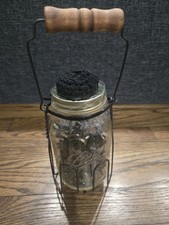 Collection Of Antique Typewriter Keys Inside Jar With Metal Holder thumbnail
