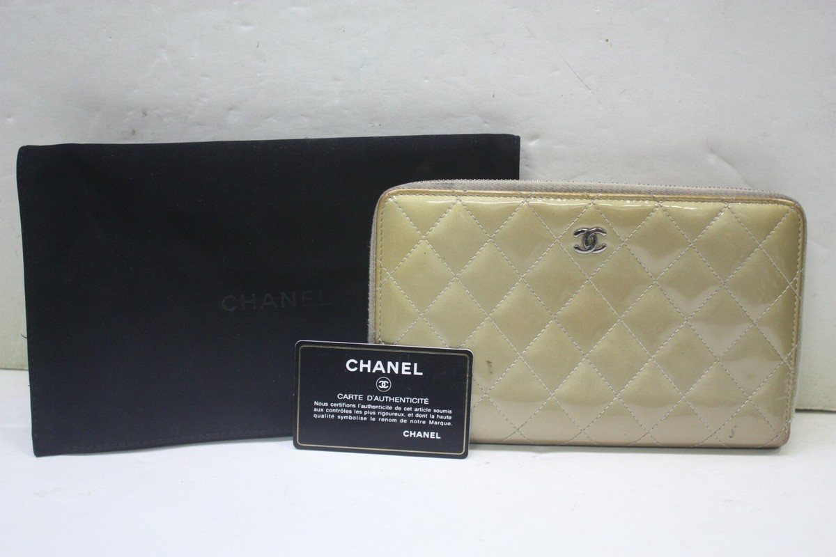 Authentic Chanel Gold Quilted Patent Leather CC Zip Around  display picture 1