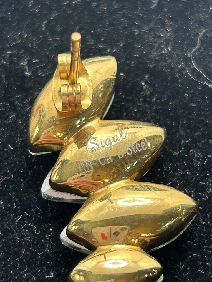 Pendientes brazalete HSN Sigal estilo acero dorado cristal marquesa $78 Foto 4 de 4