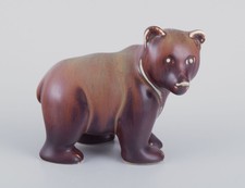 Gunnar Nylund for Rörstrand. Ceramic figurine of a bear cub. Mid-20th C.