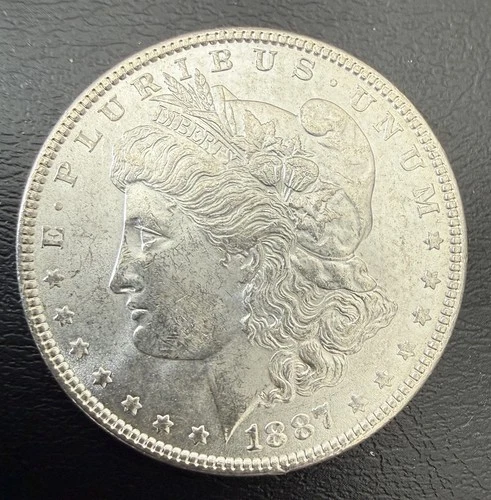1887 BRILLIANT UNCIRCULATED MORGAN SILVER DOLLAR