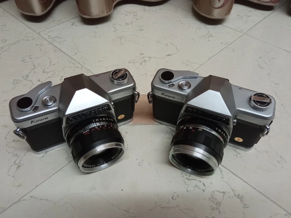 Lotto 2 fotocamere Kowa con obiettivo Kowa f/2 50mm ROTTE, PER RICAMBI - Imagen 2 de 4