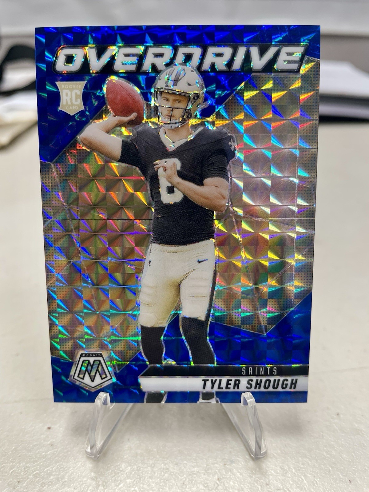 2025 Mosaic Tyler Shough Blue Overdrive Rookie 52/99 New Orleans Saints