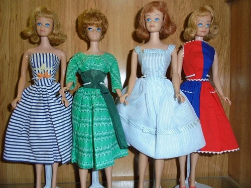 Vintage bubblecut Barbie and Three Midge Dolls in original dresses