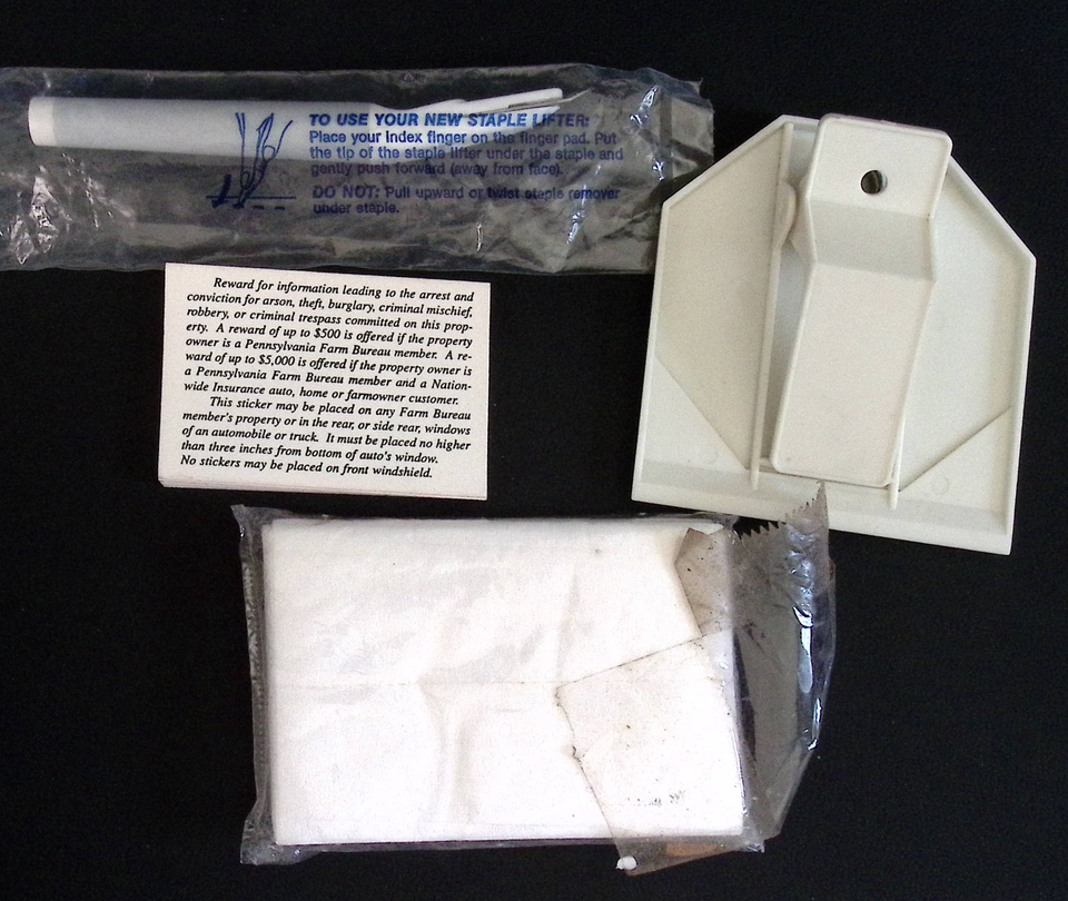 Farm Bureau Mutual Insurance memorabilia clip, staple lifter, reward