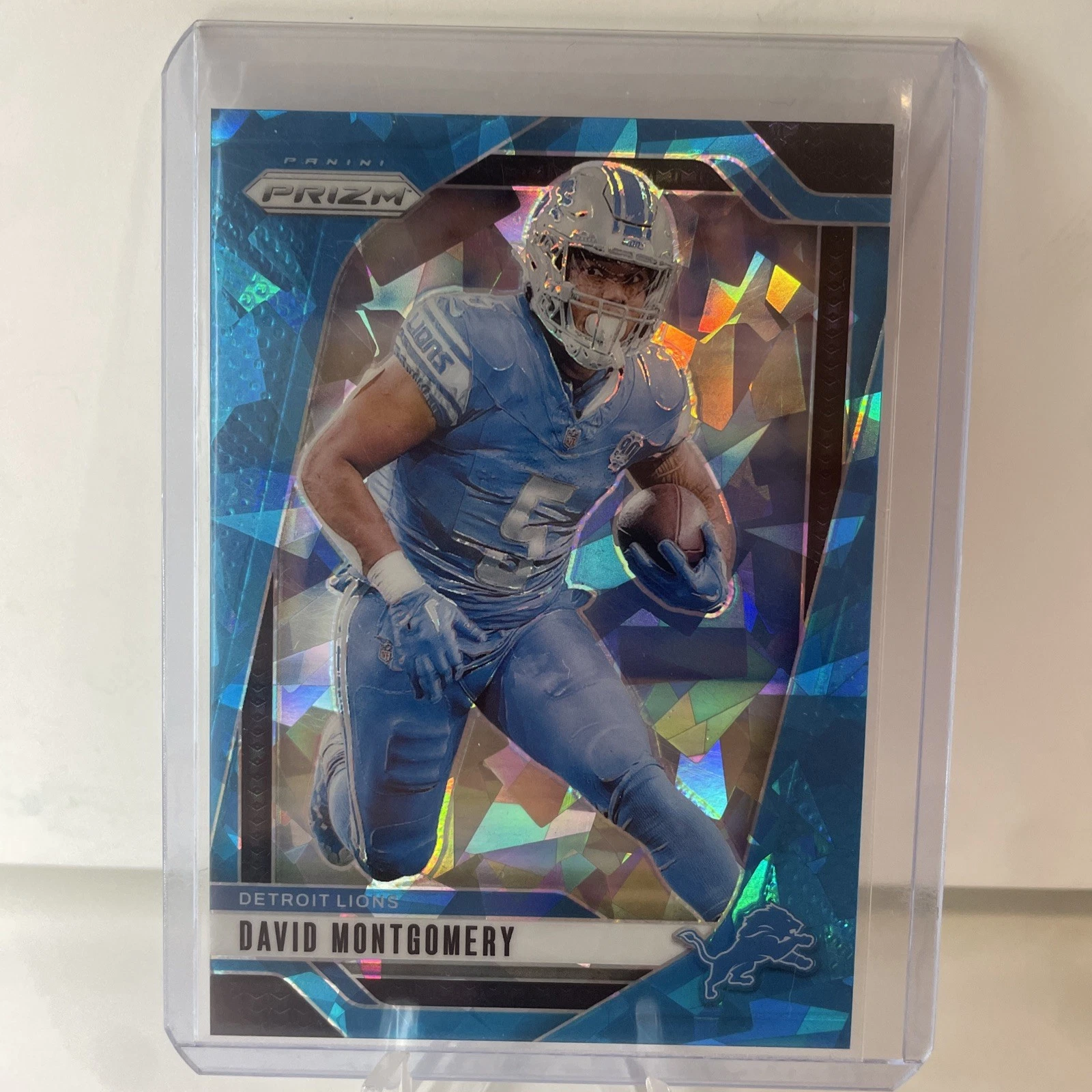 2024 Panini Prizm David Montgomery Blue Cracked Ice /99 #94!!!🔥🔥🔥