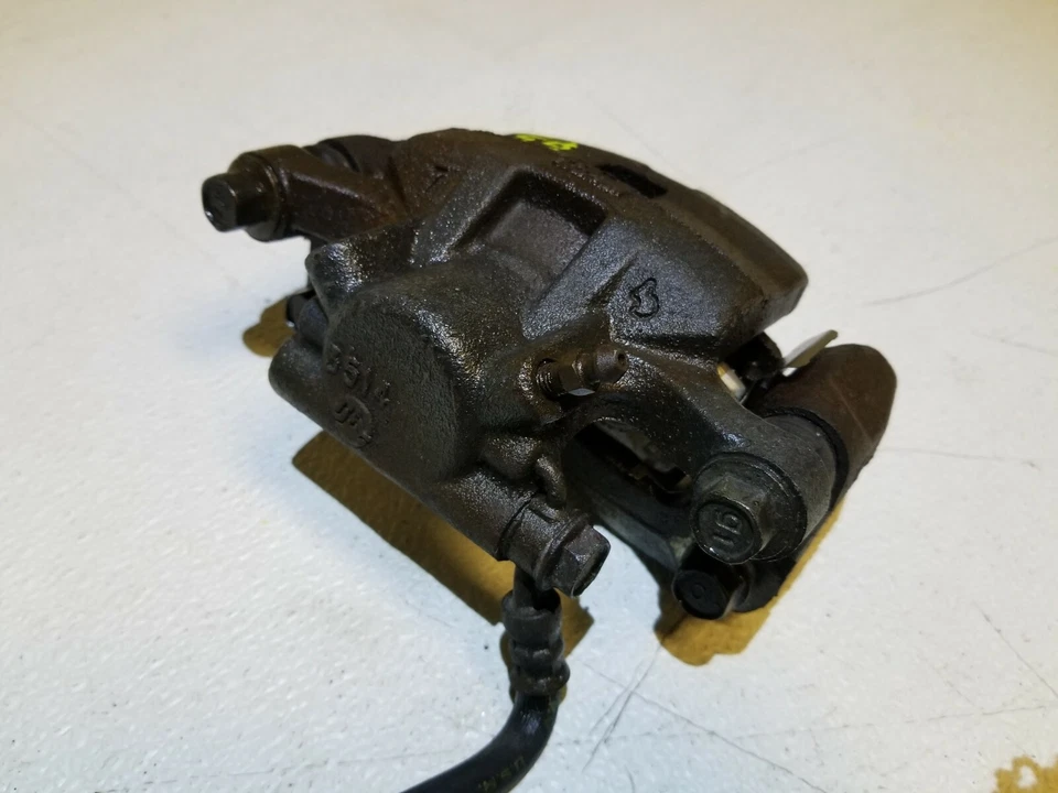 09 10 11 12 MITSUBISHI ECLIPSE 2.4L PINZA FRENO CONDUCTOR TRASERO IZQUIERDO OEM 51K millas Foto 4 de 4