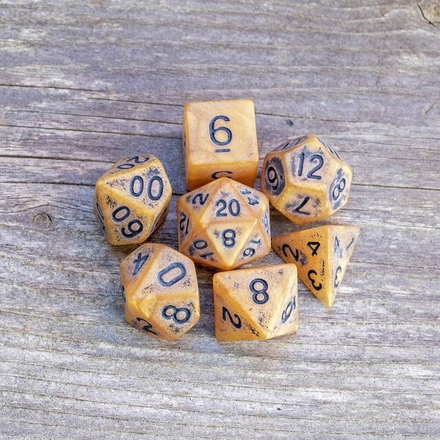 Sage's Ancient Golden Stone Black Ink Acrylic Polyhedral Dice Set