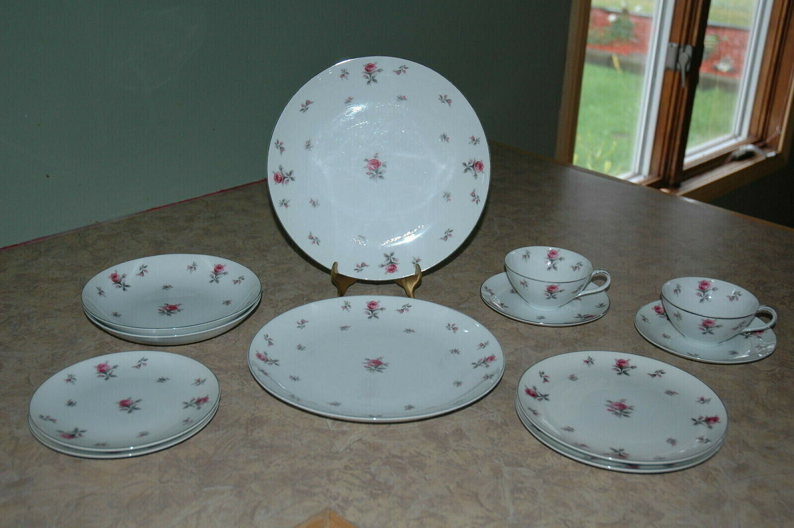 Set of eight Rosechintz by Meito fine china dinner plates from Japan