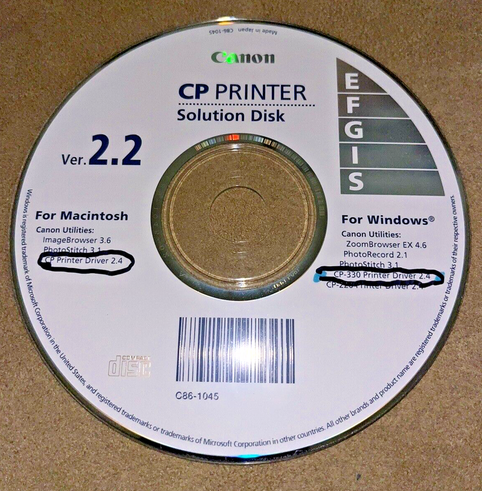 Canon CP-330 Compact Photo Printer with 2 Paper Sets, Trays, Charger & Manual