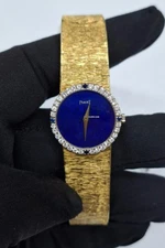 Piaget 9706A6 Blue Dial Yellow Gold Diiamond Bezel Vintage. B16224