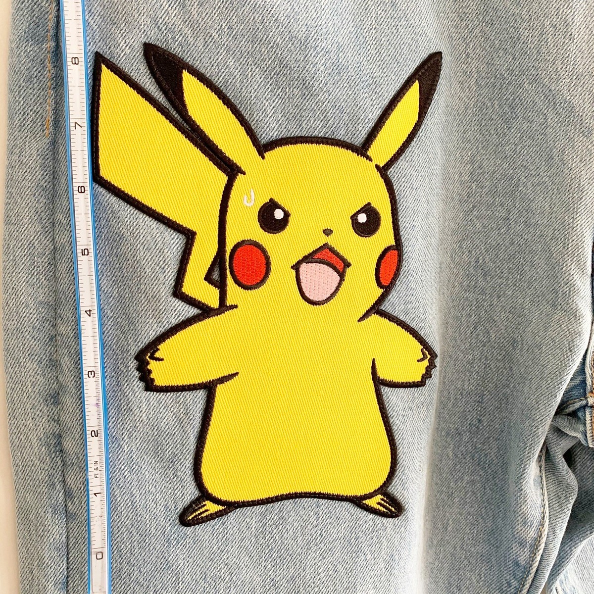Levi's x Pokemon 551z authentic straight fit jeans in Pikachu 34 X 32