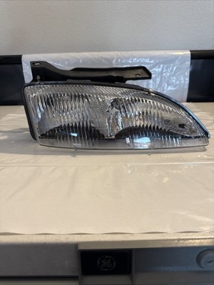 Genuine GM Chevrolet Cavalier 1995-1999 RH Passenger Headlamp New OEM 16523442