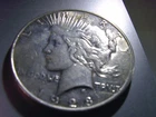 1928-S, Peace Dollar, circ, $6 over spot for this date ? yep