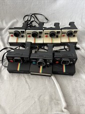 Lot of 7 POLAROID One Step Rainbow Stripe Land Cameras Untested 3 BLK, 2 W, 2 C