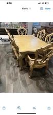 Sturdy Dining Room Set Which Includes Table, 6 Chairs and two leaves to extend