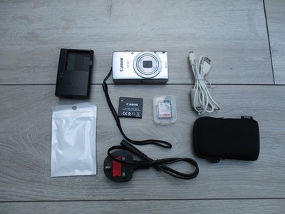 Canon IXUS 145 Digital Camera Silver Bundle Charger Battery 16GB SD Card Case