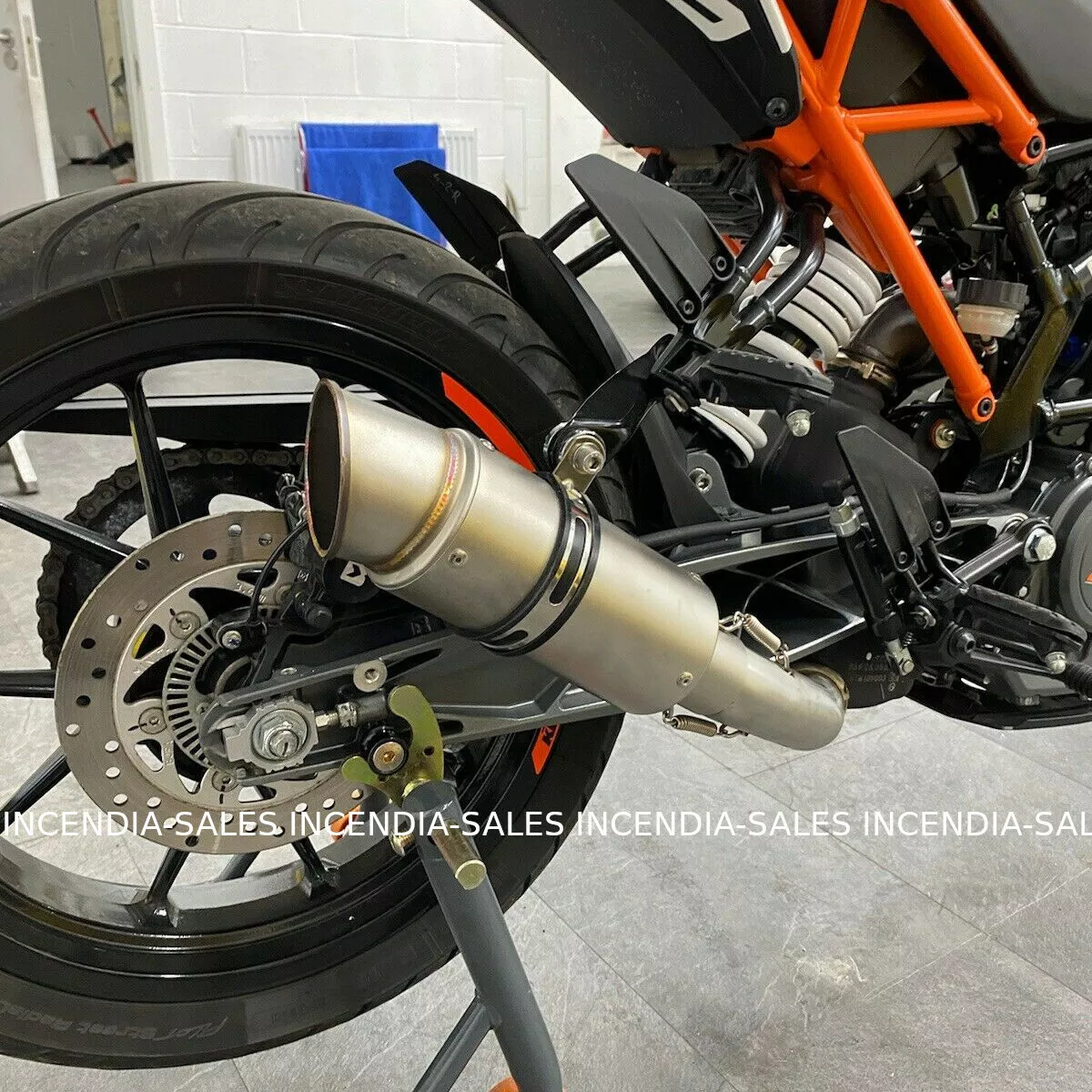 Ktm duke 125 exhaust outlet
