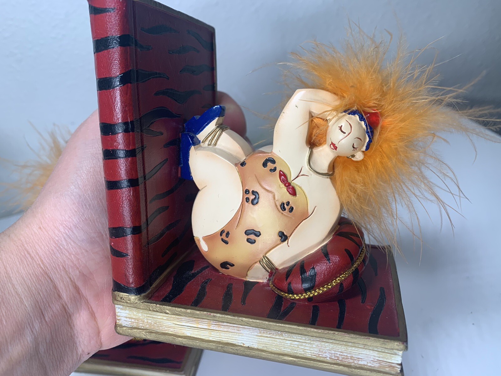 Axicon World Imports Inc. Fun Orange Feather Hair Lady in Leopard Bookends READ