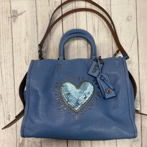 COACH 28637 X KEITH HARING BLUE PEBBLE LEATHER SEQUIN HEART ROGUE 