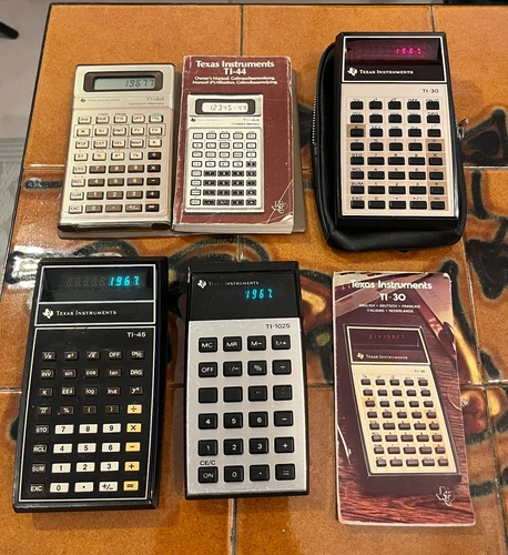 Set of 7  Texas instruments calculators - all working