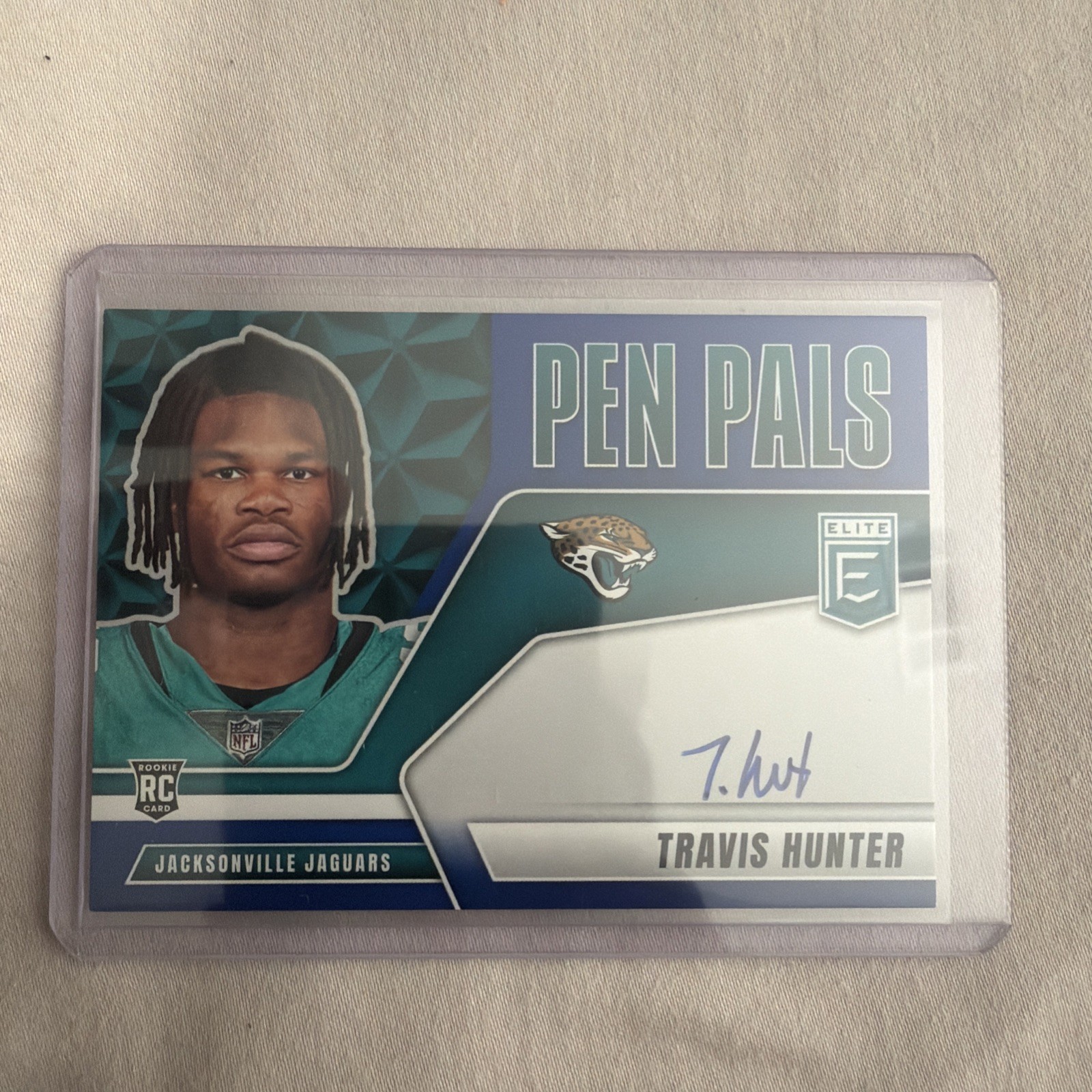 Travis Hunter 2025 Panini Donruss Elite Blue Prizm Pen Pals Auto Jaguars RC