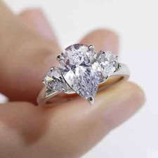 3.92 TCW Pear Cut Moissanite Three Stone Engagement Ring 14k White Gold Plated