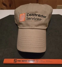 NWOT " THE HOME DEPOT CONTRACTOR SERVICES" BEIGE ADJUSTABLE BASEBALL HAT CAP