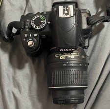 Nikon D3100 Digital SLR Camera and lens