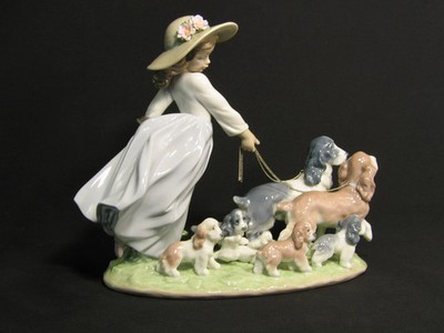 New in Box - Lladro Puppy Parade Girl with Dogs Figurine