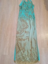 Beautiful, elegant evening dress by Conley's in a bright turquoise.