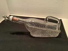 Pressed glass liquor decanter, Taurus pewter stopper