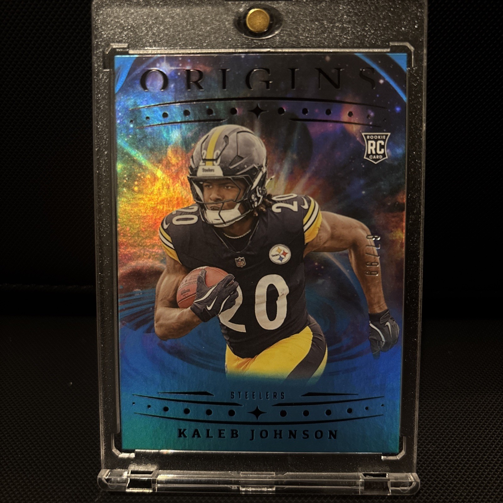 2025 Panini Origins - Kaleb Johnson, Kaleb Johnson #104 Holo Blue /99 (RC)