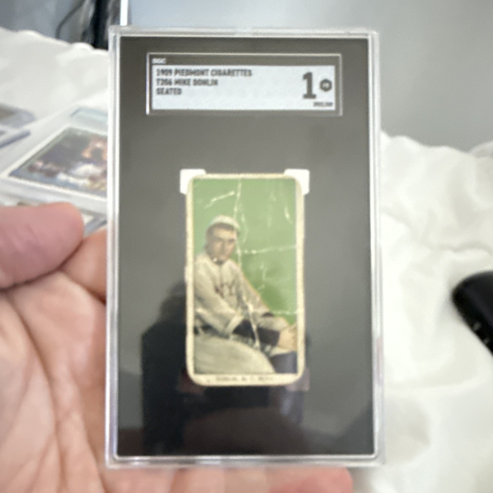 A vintage 1909–1911 T206 Piedmont Cigarettes baseball card featuring Mike Donlin
