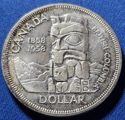 A 1958 Canada Silver Dollar!  Beautiful Coin! British Columbia Totem Pole