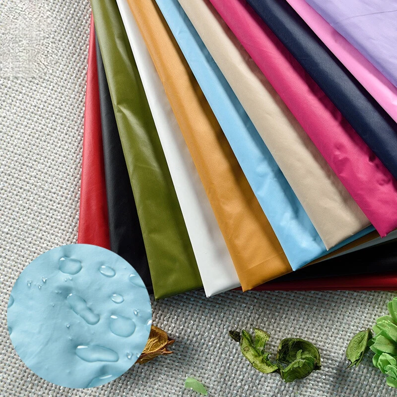 Tela de nailon ultrafina 20D 380T microfibra impermeable para chaqueta de plumón acolchada Foto 3 de 4