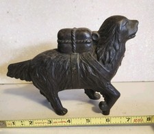 VINTAGE CAST IRON DOG WITH PACK STILL BANK