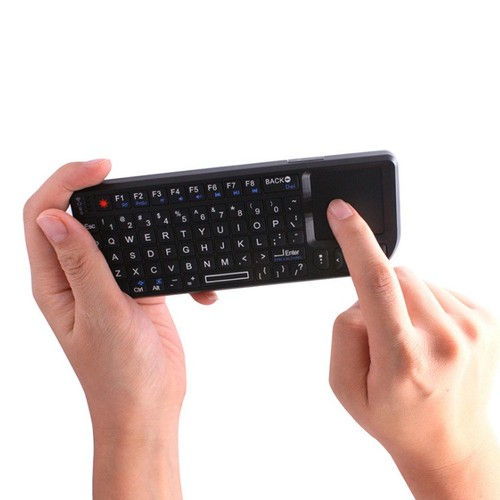Portatile Mini Tastiera wireless 2.4GHz Bluetooth Laser Con Touch Flying Squirr - Foto 1 di 8