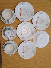 Ostfriesenrose, 3 Teetassen mit Untertassen, 5 Tellern 