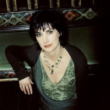 Enya Unsigned 8" x 8" Photo - Irish singer - Donation to Cancer Charity *A