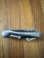 10 Blade/ Accessories Pocket Knife 4" Long. Black And Silver