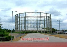 PHOTO  GASOMETER NEAR A6010 ROAD MANCHESTER THESE HUGE GAS STORAGE STRUCTURES AR